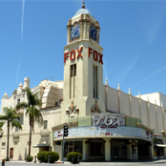 Fox Theater Bakersfield with ornate clock tower, red FOX sign