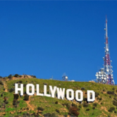 A close-up view of the Hollywood Sign on a sunny day in Los Angeles